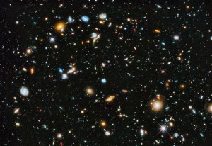  Click to enlarge. Hubble Ultra Deep Field 2014 - Image Credit: NASA, ESA, H.Teplitz and M.Rafelski (IPAC/Caltech), A. Koekemoer (STScI), R. Windhorst(ASU), Z. Levay (STScI) -- Galaxies fill the Hubble Ultra Deep Field 2014. The dimmest galaxies are more than 10 billion times fainter than stars visible to the unaided eye and represent the Universe in the extreme past, a few 100 million years after the Big Bang. The image itself was made with the significant addition of ultraviolet data to the Hubble Ultra Deep Field, an update of Hubble's famous most distant gaze toward the southern constellation of Fornax. It now covers the entire range of wavelengths available to Hubble's cameras, from ultraviolet through visible to near-infrared. Ultraviolet data adds the crucial capability of studying star formation in the Hubble Ultra Deep Field galaxies between 5 and 10 billion light-years distant. 