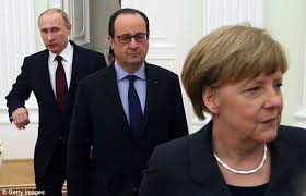Vladimir Putin, Francois Hollande, and Angela Merkel (--the Daily Mail0