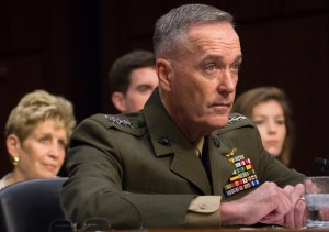 Gen. Joseph F. Dunford, Jr. listens to opening statements during Senate Armed Services Committee hearing on his nomination as chairman of the Joint Chiefs of Staff, July 9, 2015. Behind him are wife, Ellyn, son Patrick and niece, Jenna Sartucci. (--Joe Gromelski/Stars and Stripes)
