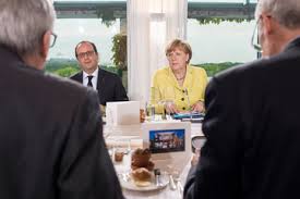 Francois Hollande, Angela Merkel (--zimbio.com)