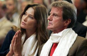 France's former first lady Carla Bruni-Sarkozy and then foreign minister Bernard Kouchner at inauguration of Buddhist Lerab Ling temple in Roqueredonde, France, also attended by the Dalai Lama. "I told him he was always welcome in France," said Kouchner, who met the Dalai Lama briefly afterwards. (--AFP/GETTY)