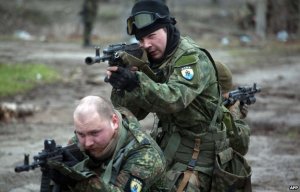 Volunteers from ultranationalist Azov battalion train near Mariupol. (http://catholicchurchapologetics.yuku.com) 