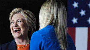 Hillary Clinton greeted by Ellen Gustafson before foreign policy talk in San Diego. (--San Diego Times/Ken Stone)